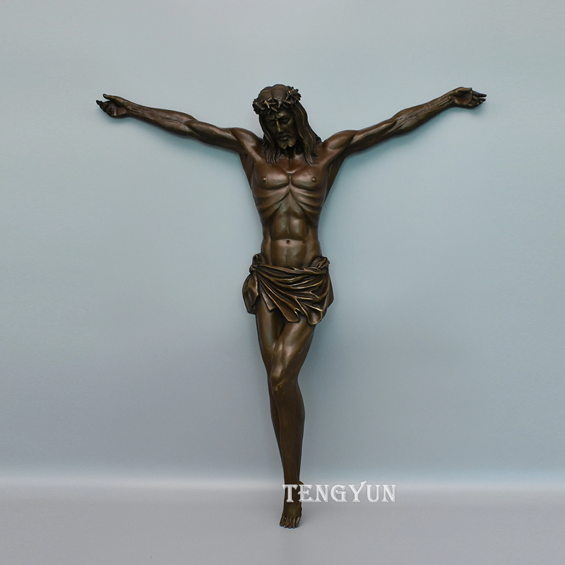 Bronze Jesus statue on cross