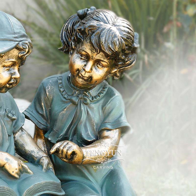 Bronze children reading sculpture (1)