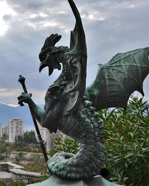 Bronze dragon with wings and rooster head