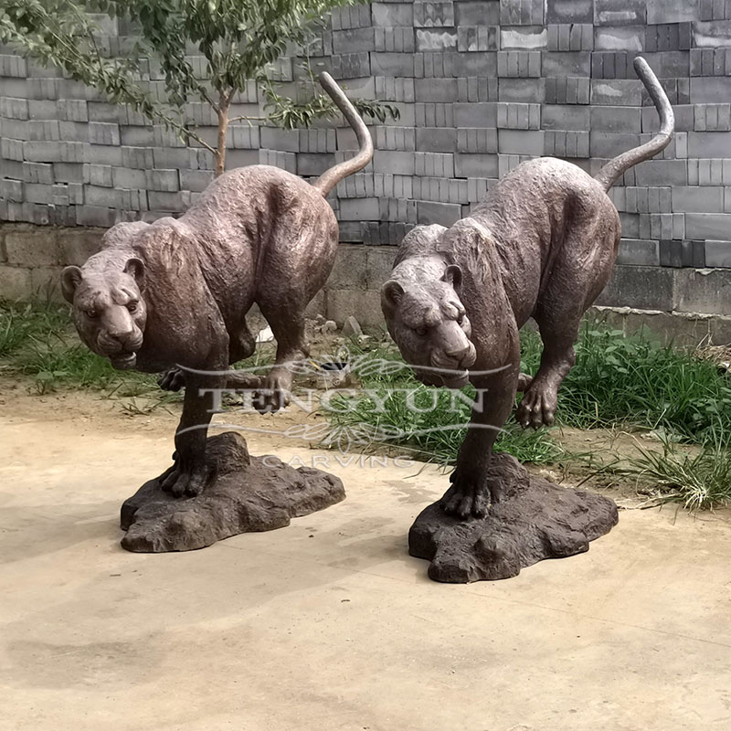 Bronze leopard statues (2)