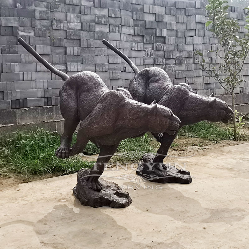 Bronze leopard statues (4)