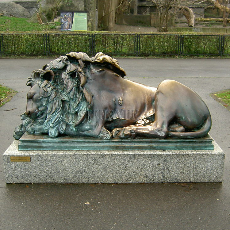 Bronze sleeping lion sculptures (1)