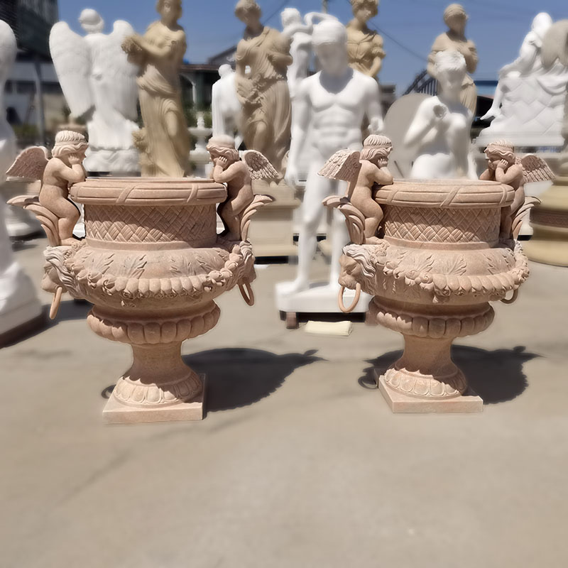 Pair of marble flowerpot with little angels and lion head on it