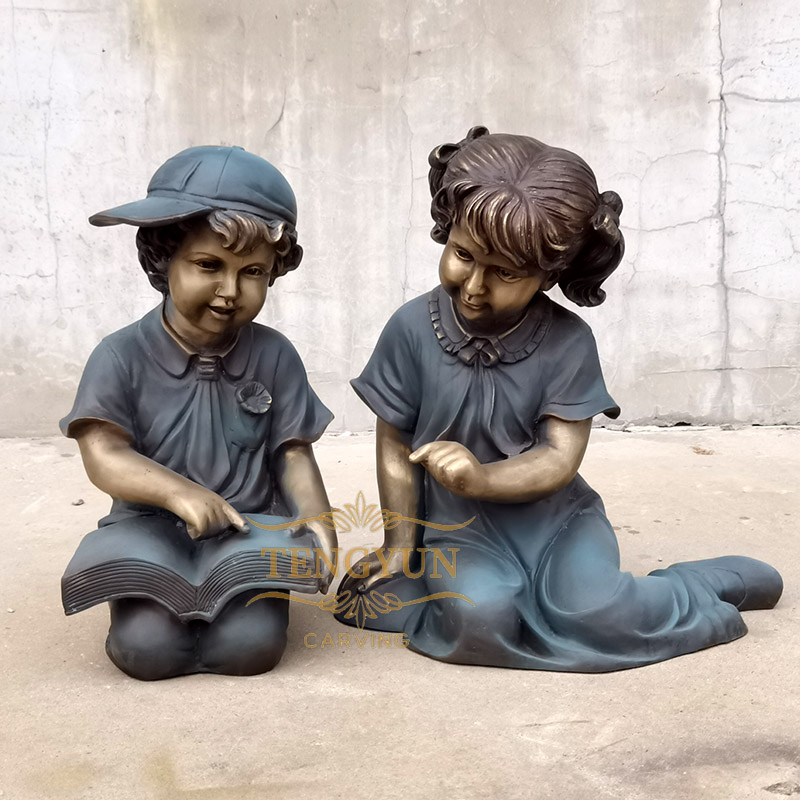 https://www.firststatue.com/popular-bronze-children-reading-garden-statue-modern-boy-and-girl-child-sculpture-product/