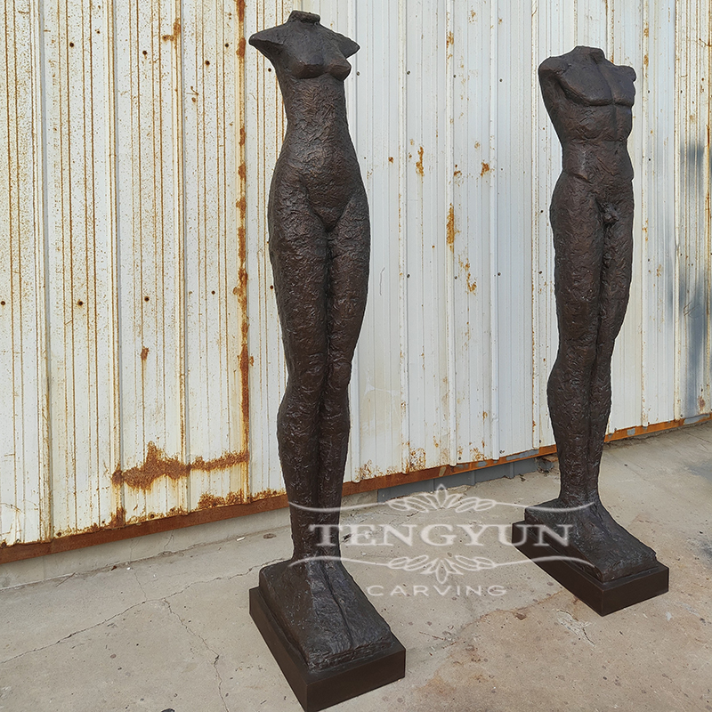 bronze male and female torso sculpture (2)