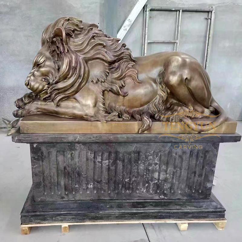 bronze sleeping lion sculpture