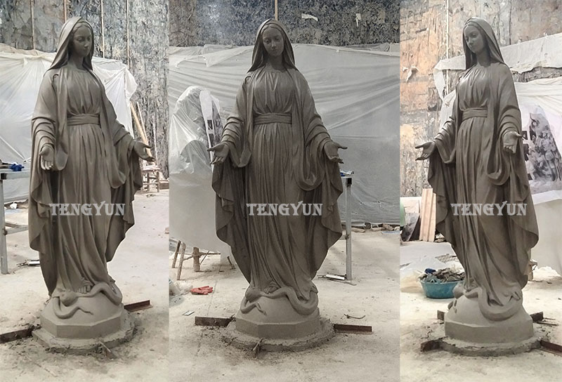 clay mold of bronze virgin Mary statue