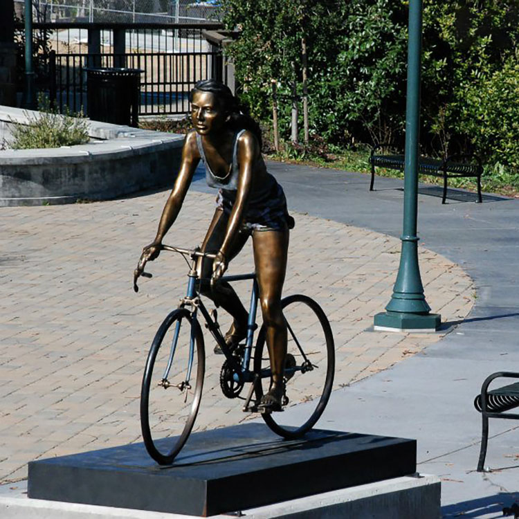 female ride a bike bronze statue (1)