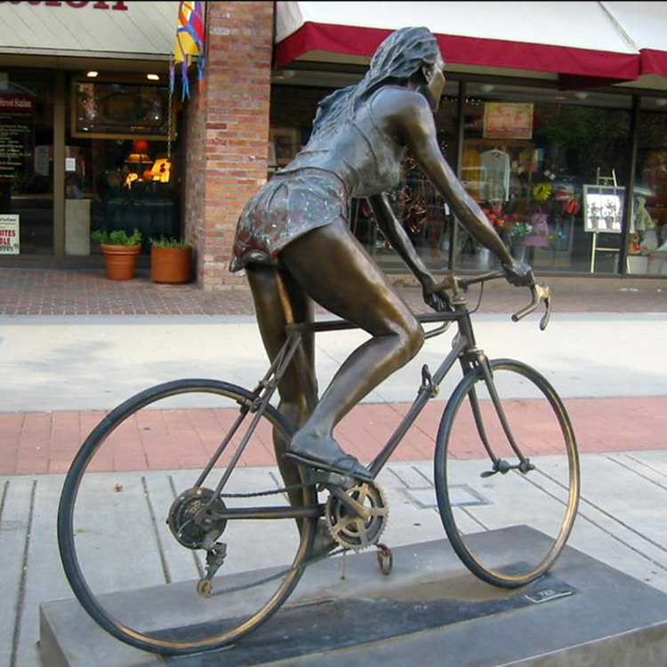 female ride a bike bronze statue (1)